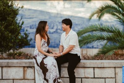 Couple in Lisbon, Portugal. Romantic moment with azulejo tiles backdrop. Travel photography.