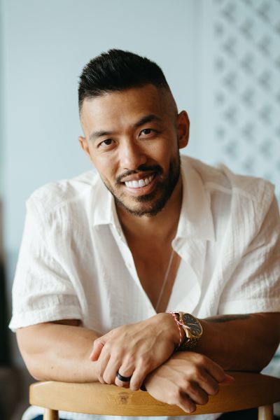 Smiling man in Lisbon. Portrait of a stylish man with watch, relaxed and happy. Portugal vibes.